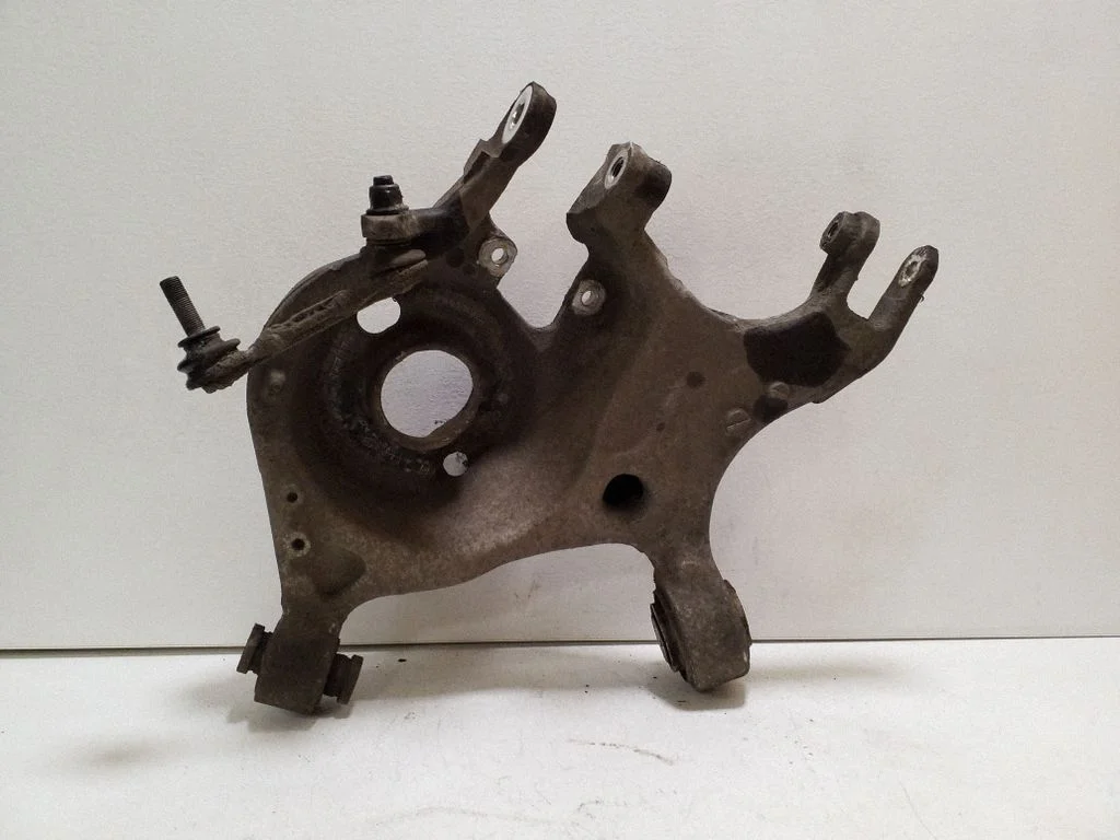 Rear upper control arm/wishbone – left