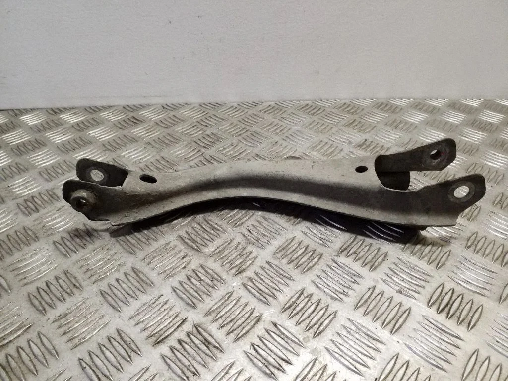 Rear upper control arm/wishbone – left