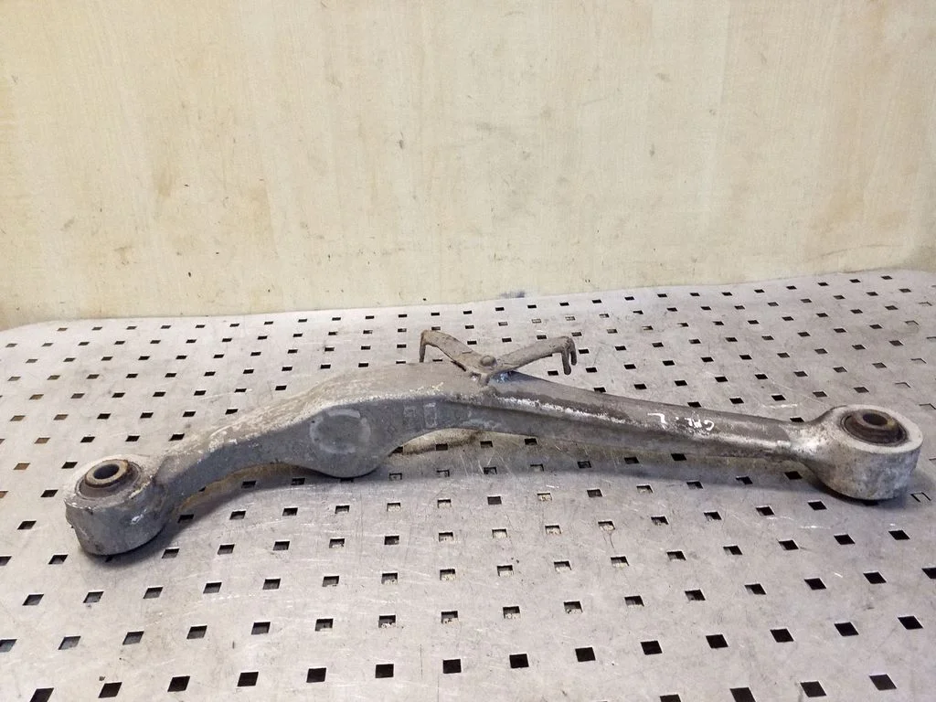 Rear upper control arm/wishbone – left