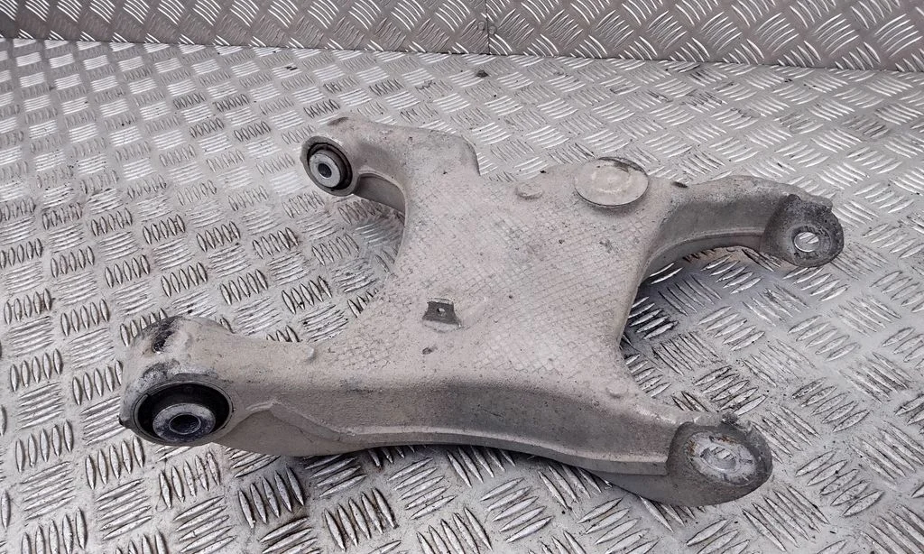 Rear upper control arm/wishbone – left