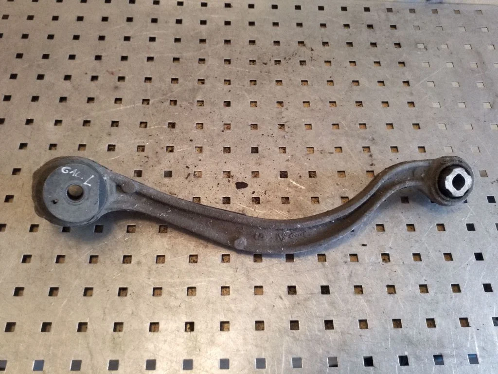 Rear upper control arm/wishbone – left
