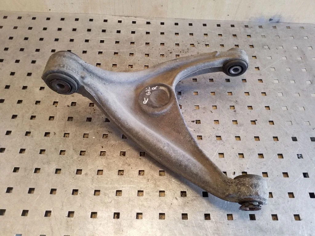 Rear upper control arm/wishbone – right