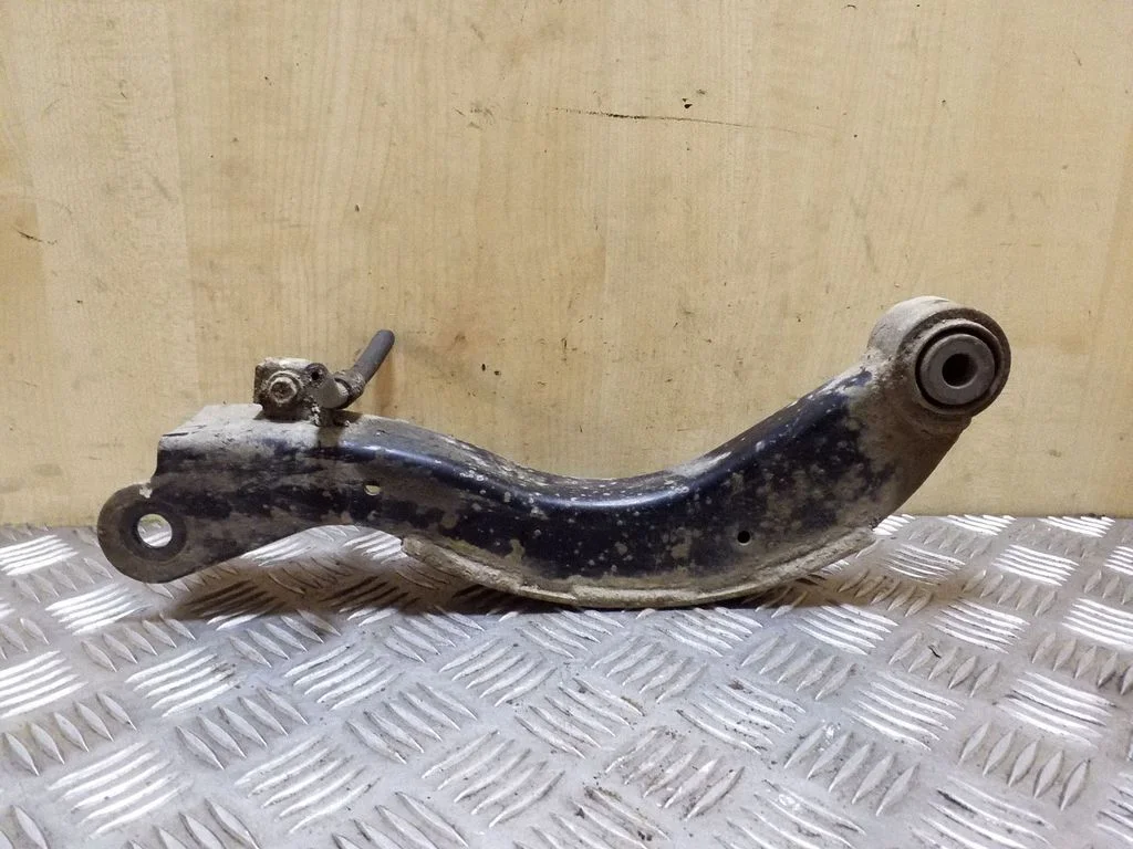 Rear upper control arm/wishbone – left