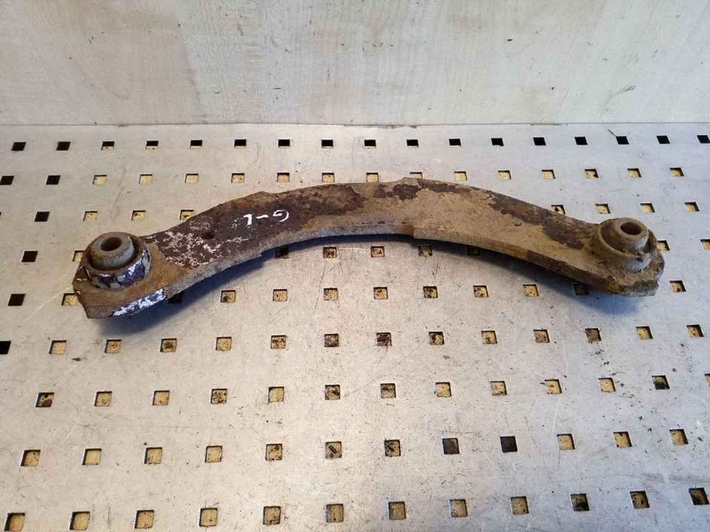 Rear upper control arm/wishbone – left