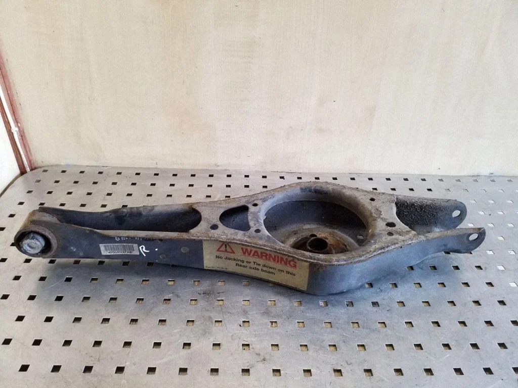 Rear upper control arm/wishbone – right