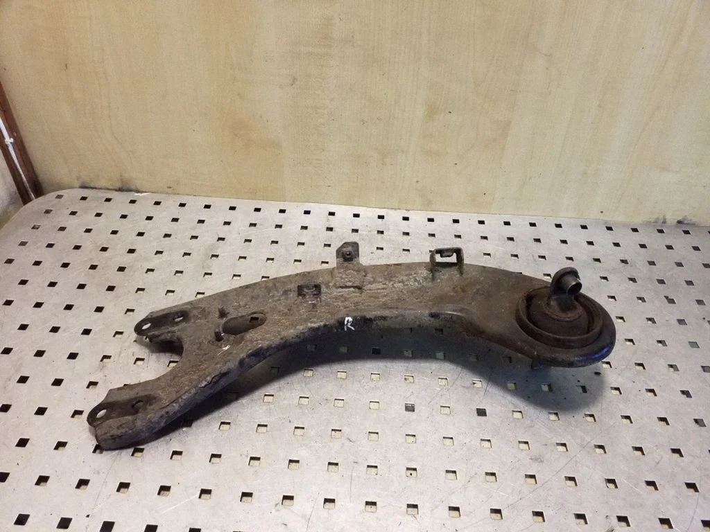 Rear upper control arm/wishbone – right