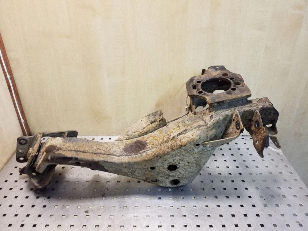 Rear upper control arm/wishbone – left