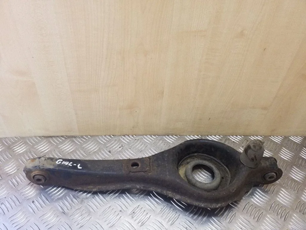 Rear upper control arm/wishbone – left