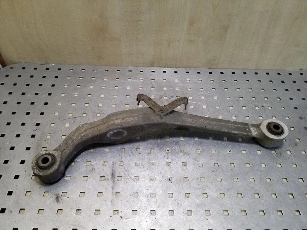 Rear upper control arm/wishbone – left
