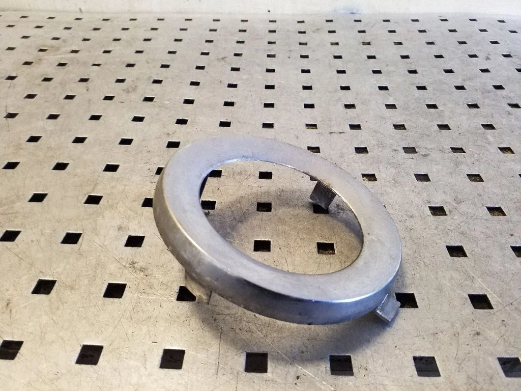 Front fog light trim/grill 57731SC000