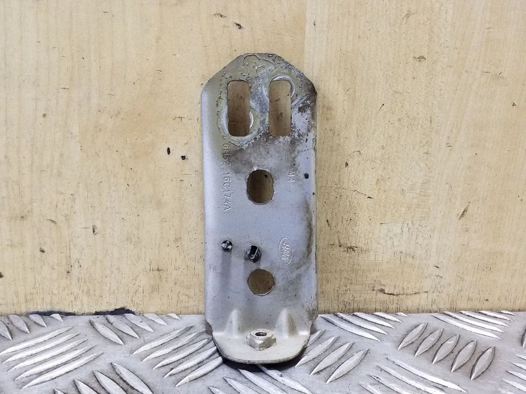Fender mounting bracket 6H5216C174A