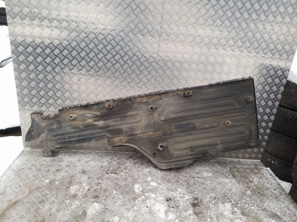 Center/middle under tray cover 9X23112C28AB