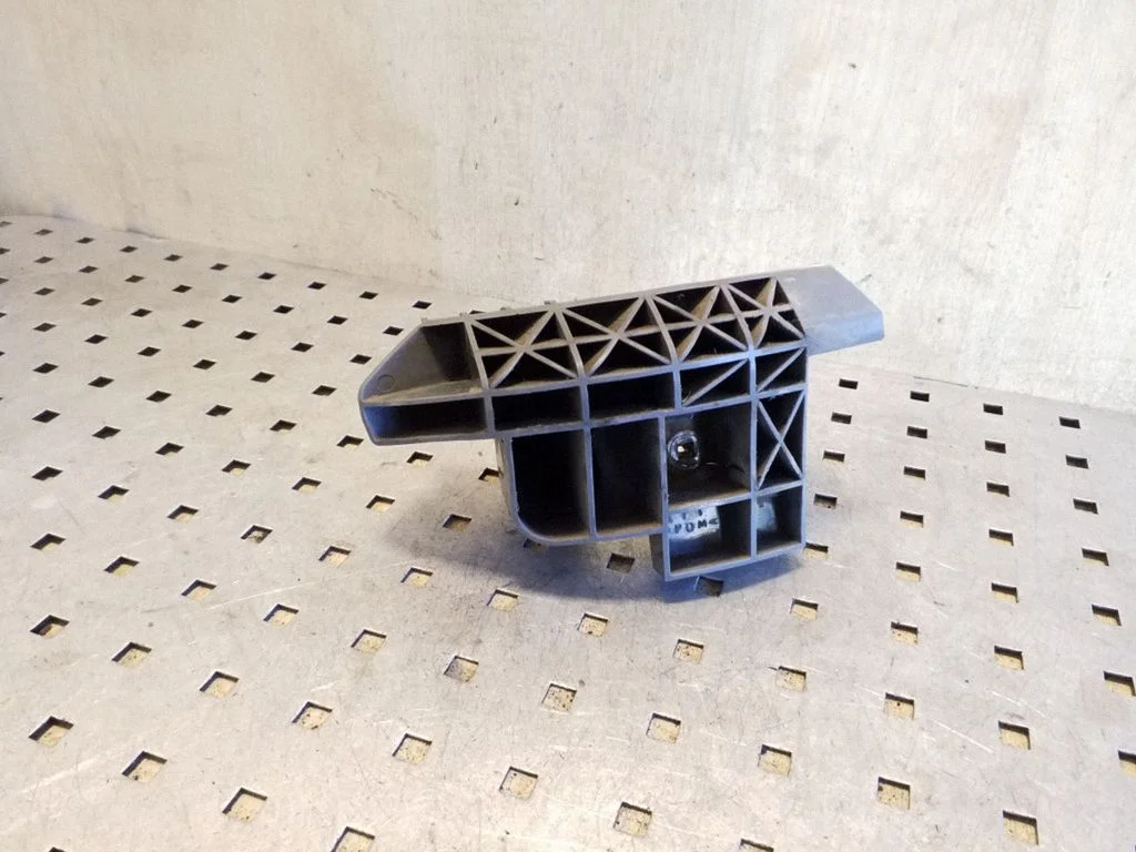 Rear bumper mounting bracket – right