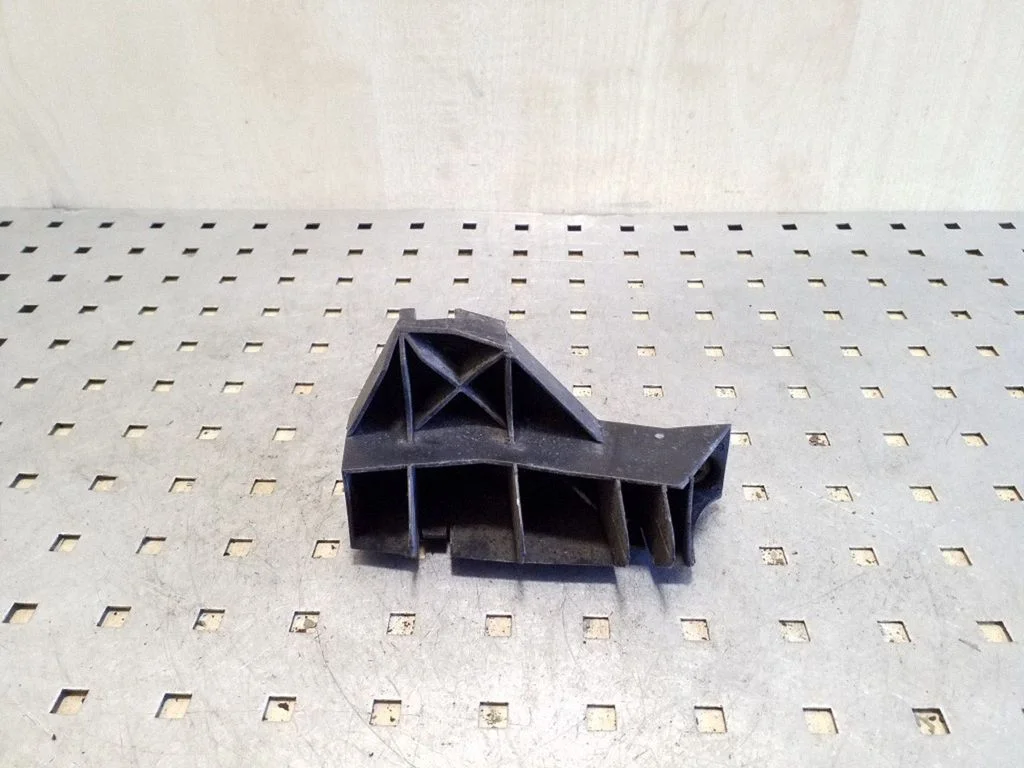 Rear bumper mounting bracket – right