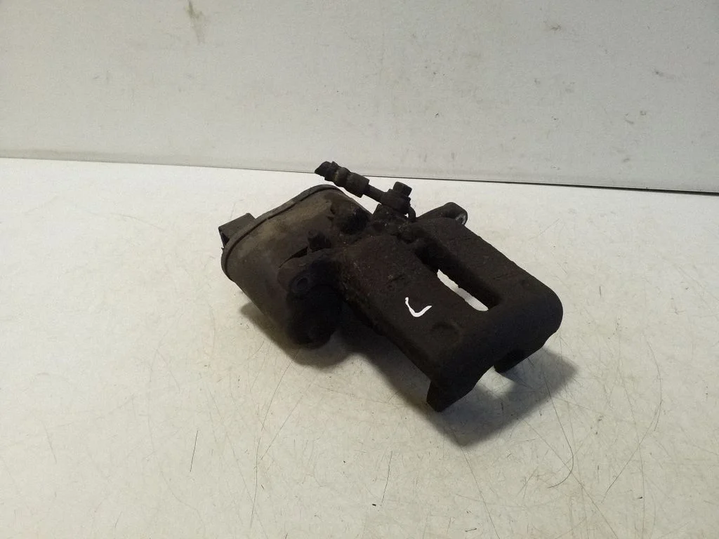 Rear brake caliper 32332594