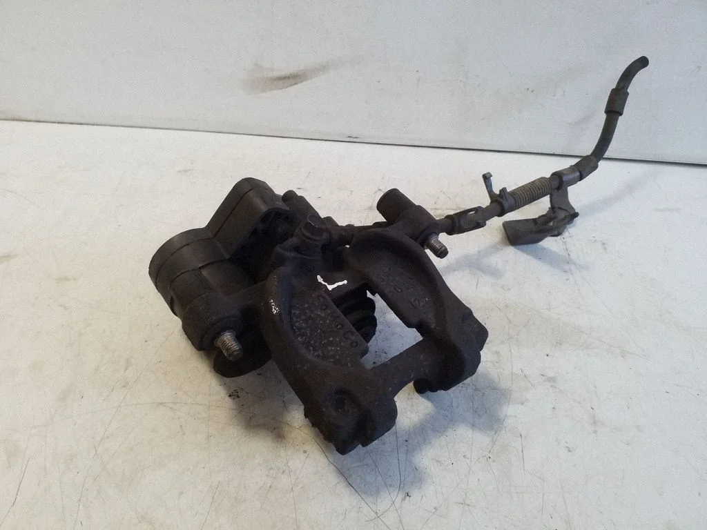Rear brake caliper – right