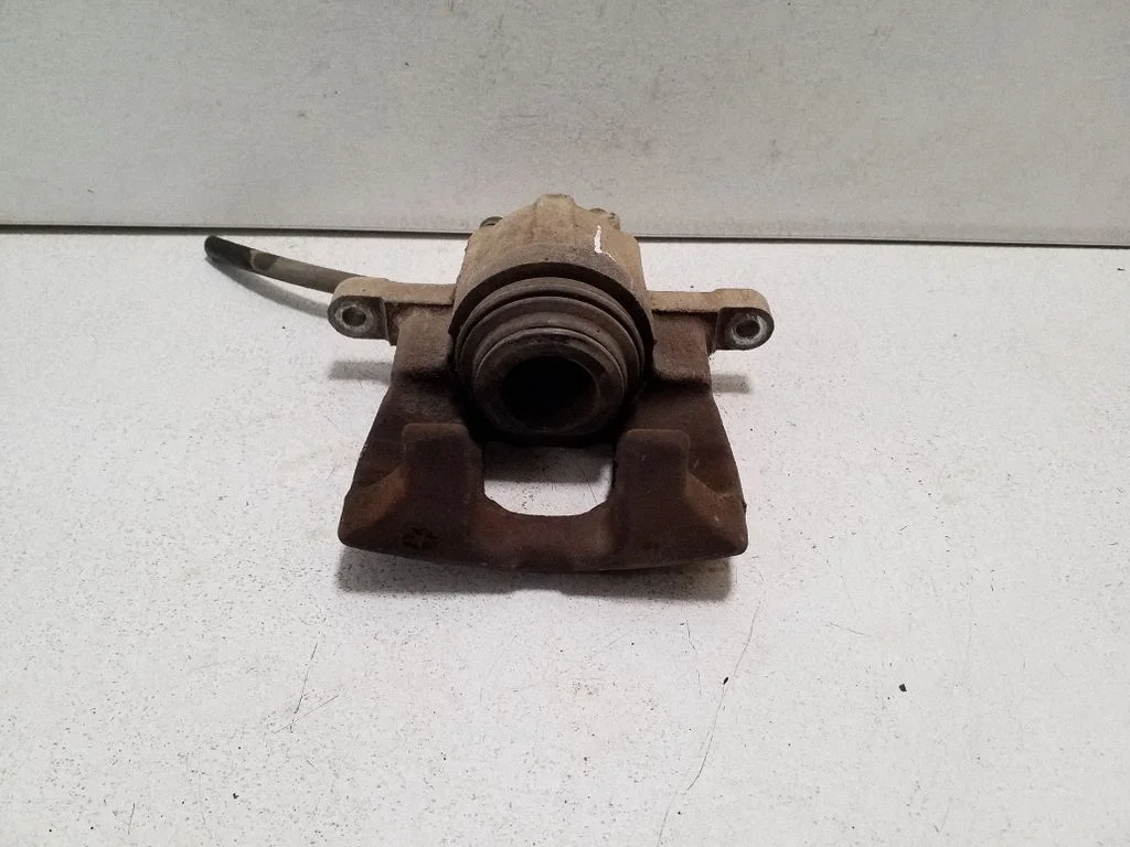 Rear brake caliper – left