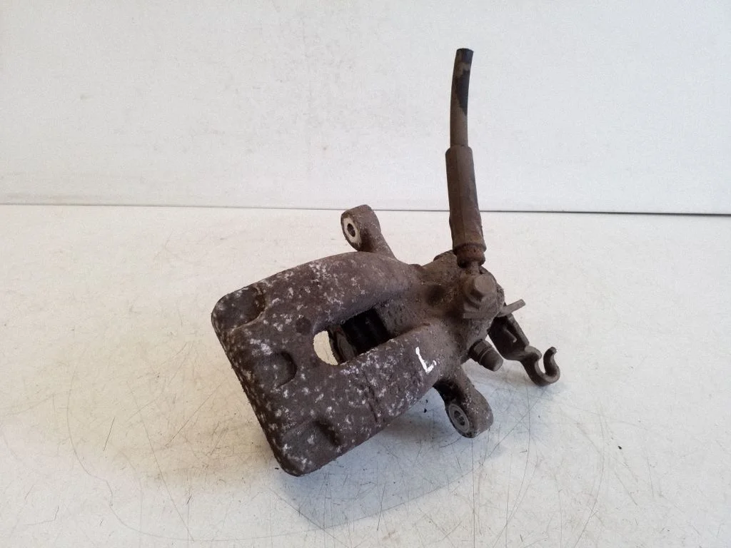 Rear brake caliper – left