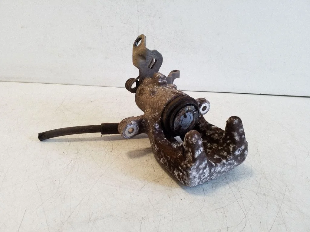 Rear brake caliper – right
