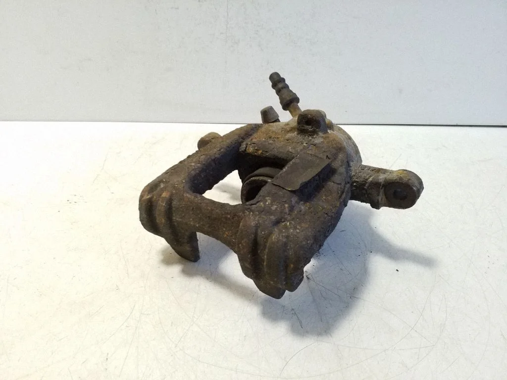 Rear brake caliper – right
