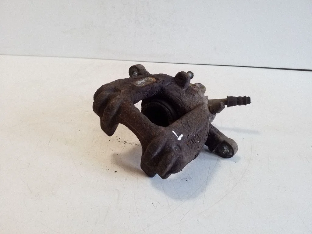 Rear brake caliper – left