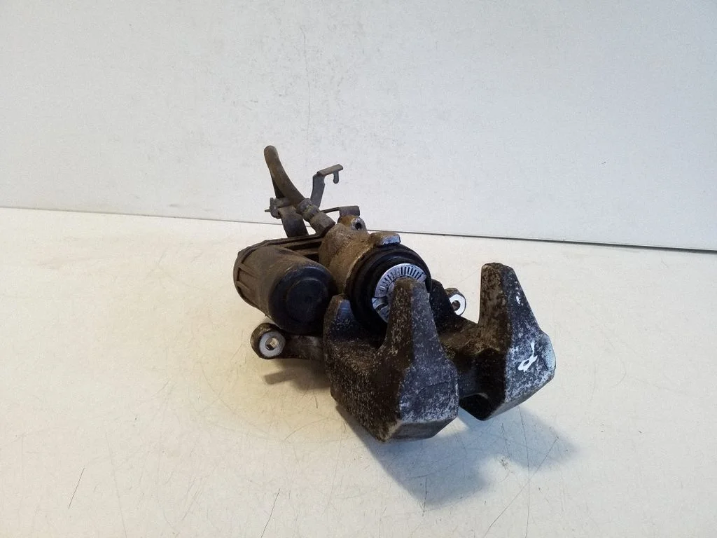 Rear brake caliper – right