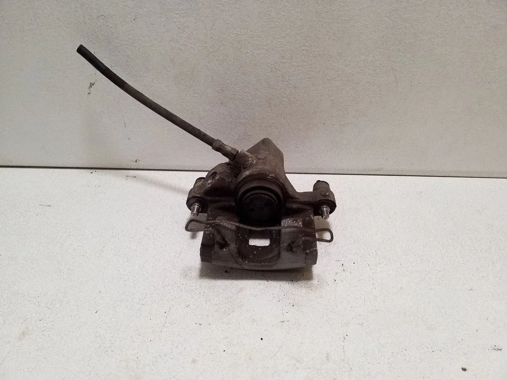 Rear brake caliper – right