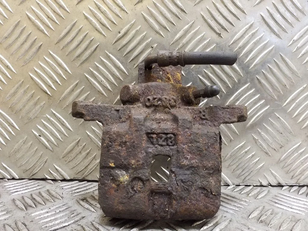 Rear brake caliper – right