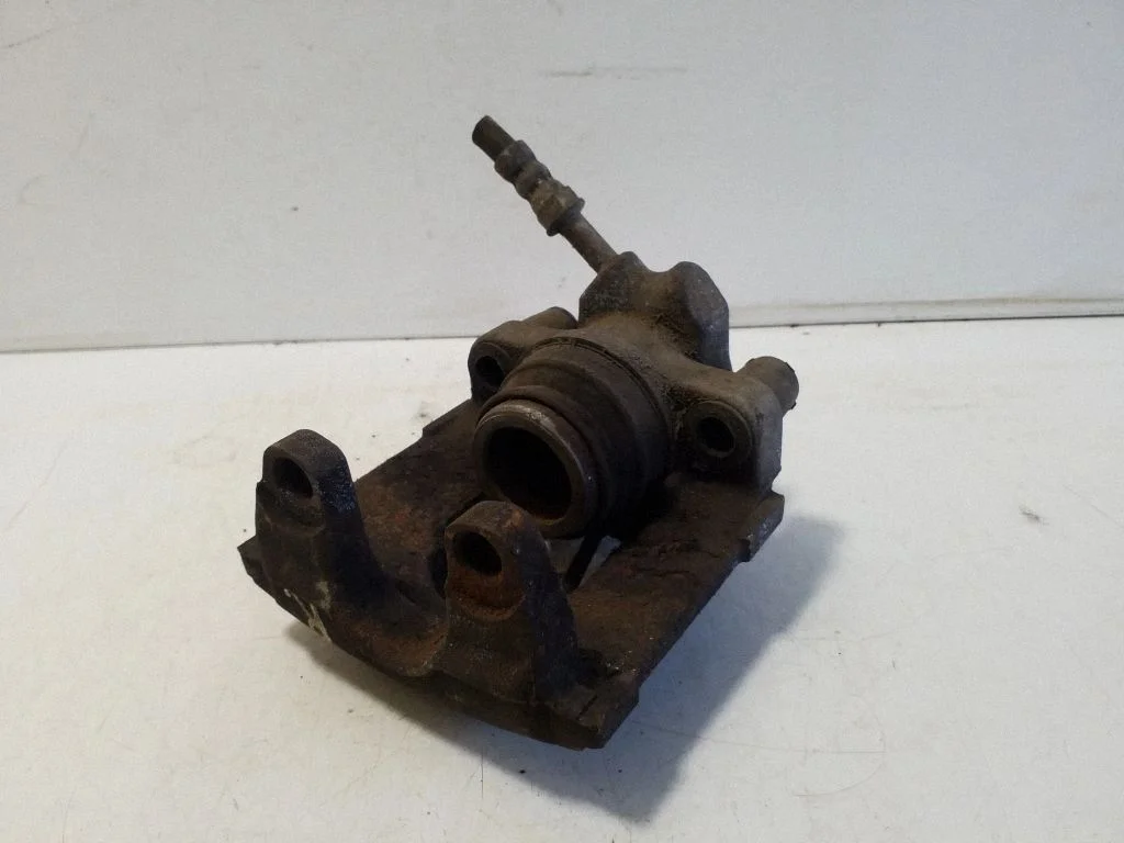 Rear brake caliper – right