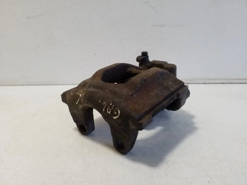 Rear brake caliper – left