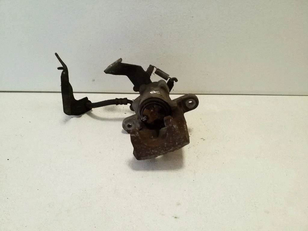 Rear brake caliper – right