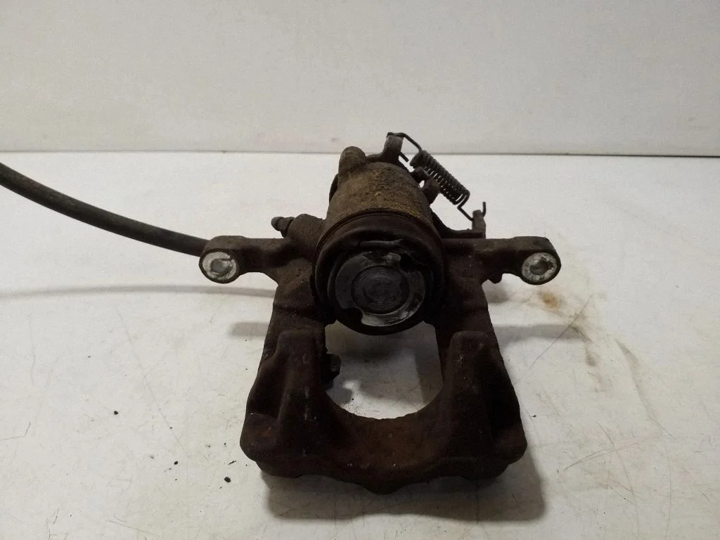 Rear brake caliper – right
