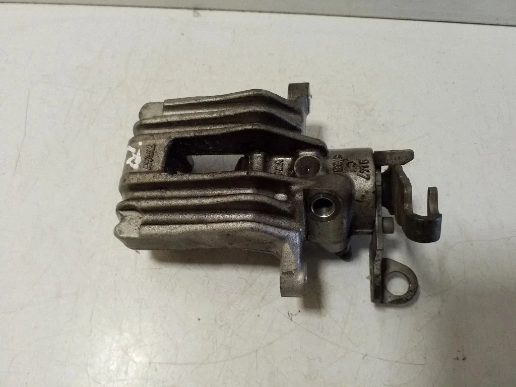 Rear brake caliper – right