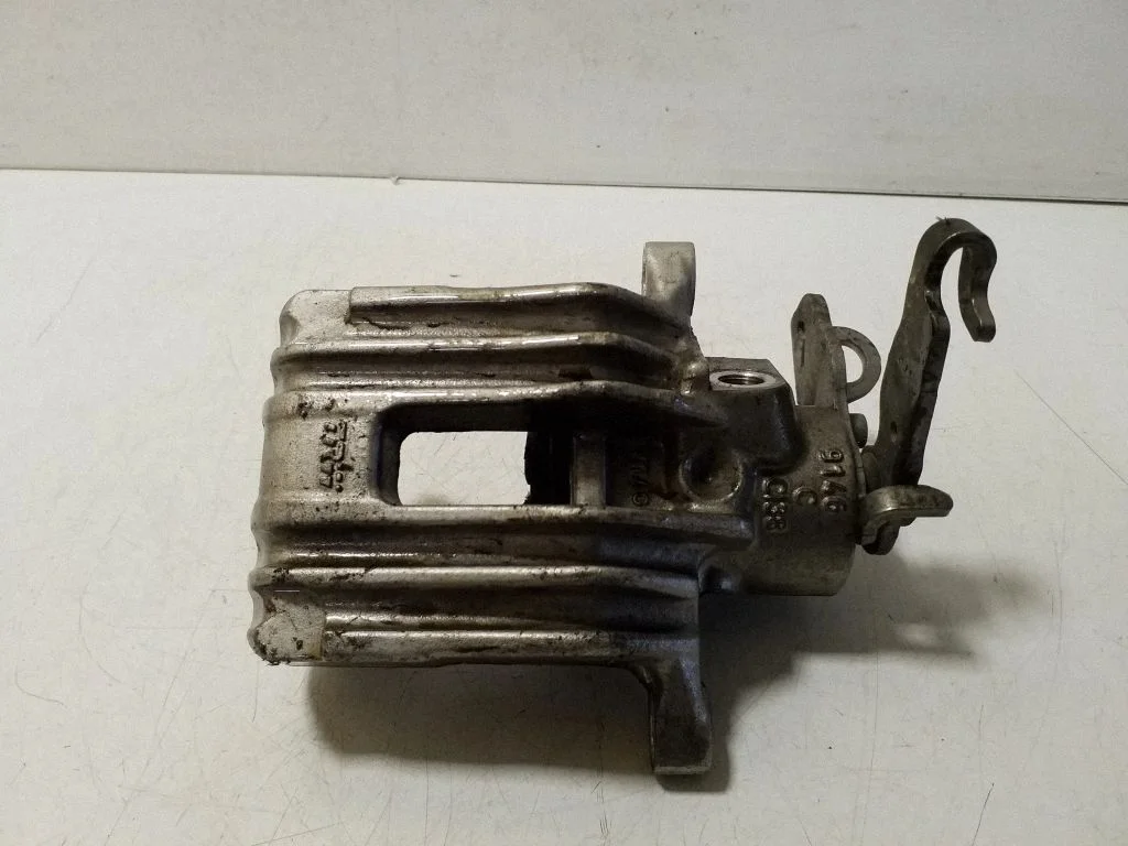 Rear brake caliper – left