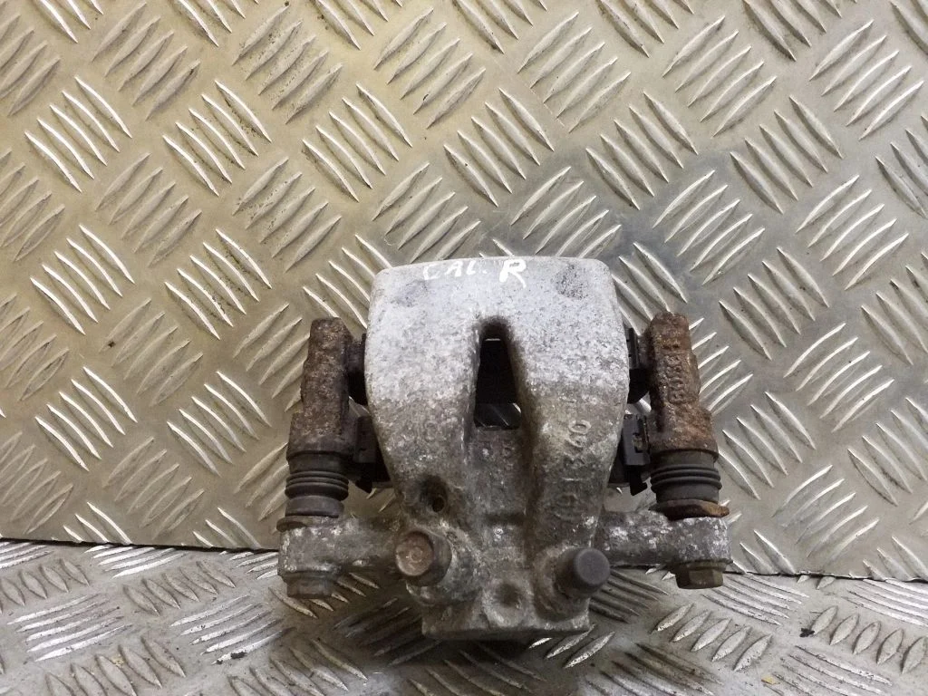 Rear brake caliper – right