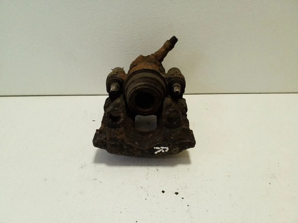 Rear brake caliper – right