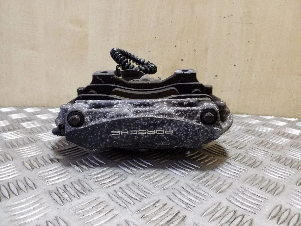 Rear brake caliper 7P5615403S