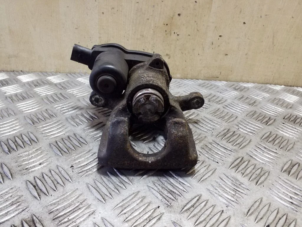 Rear brake caliper – right