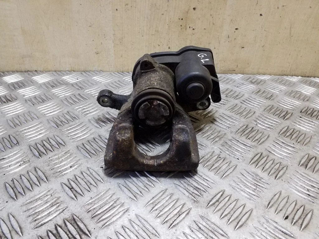 Rear brake caliper – left