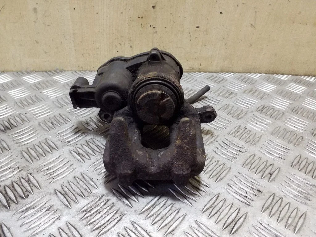 Rear brake caliper – right