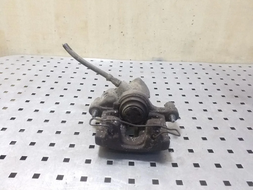 Rear brake caliper – right