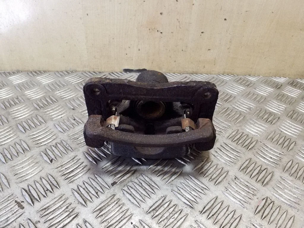 Rear brake caliper – right