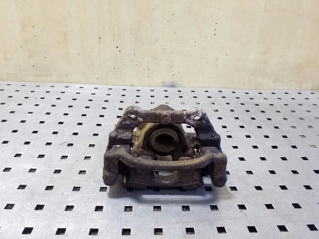 Rear brake caliper – right