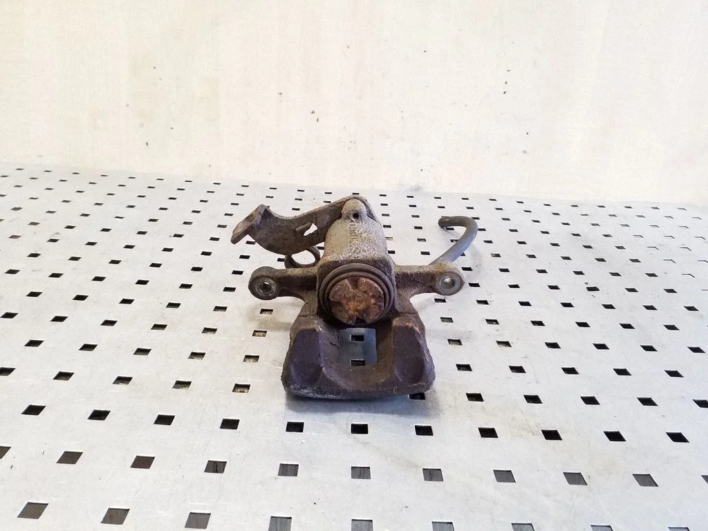 Rear brake caliper – right