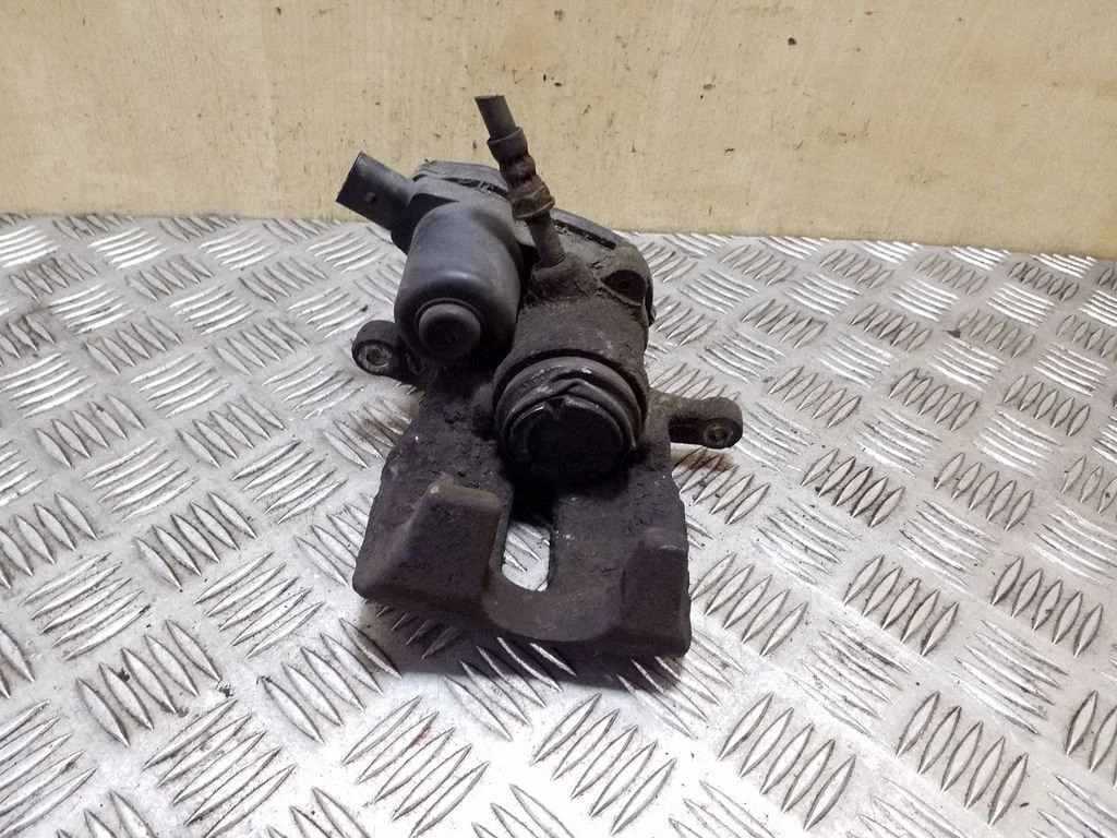 Rear brake caliper 32335478