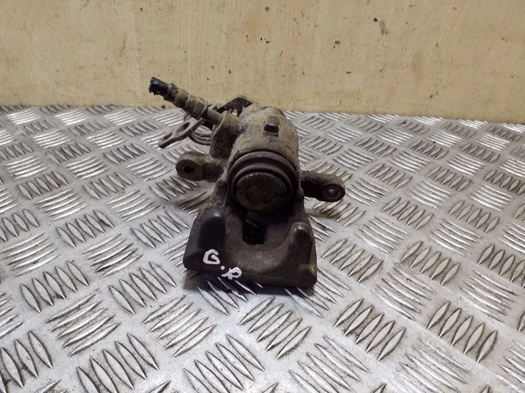 Rear brake caliper – right