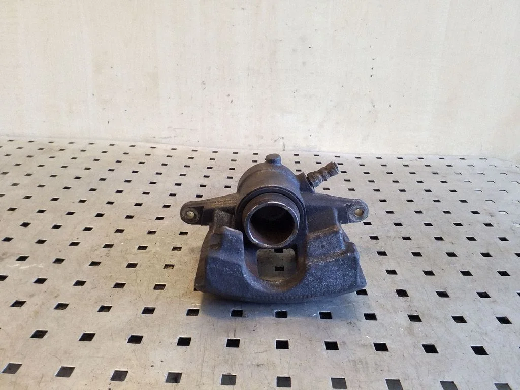 Rear brake caliper – right