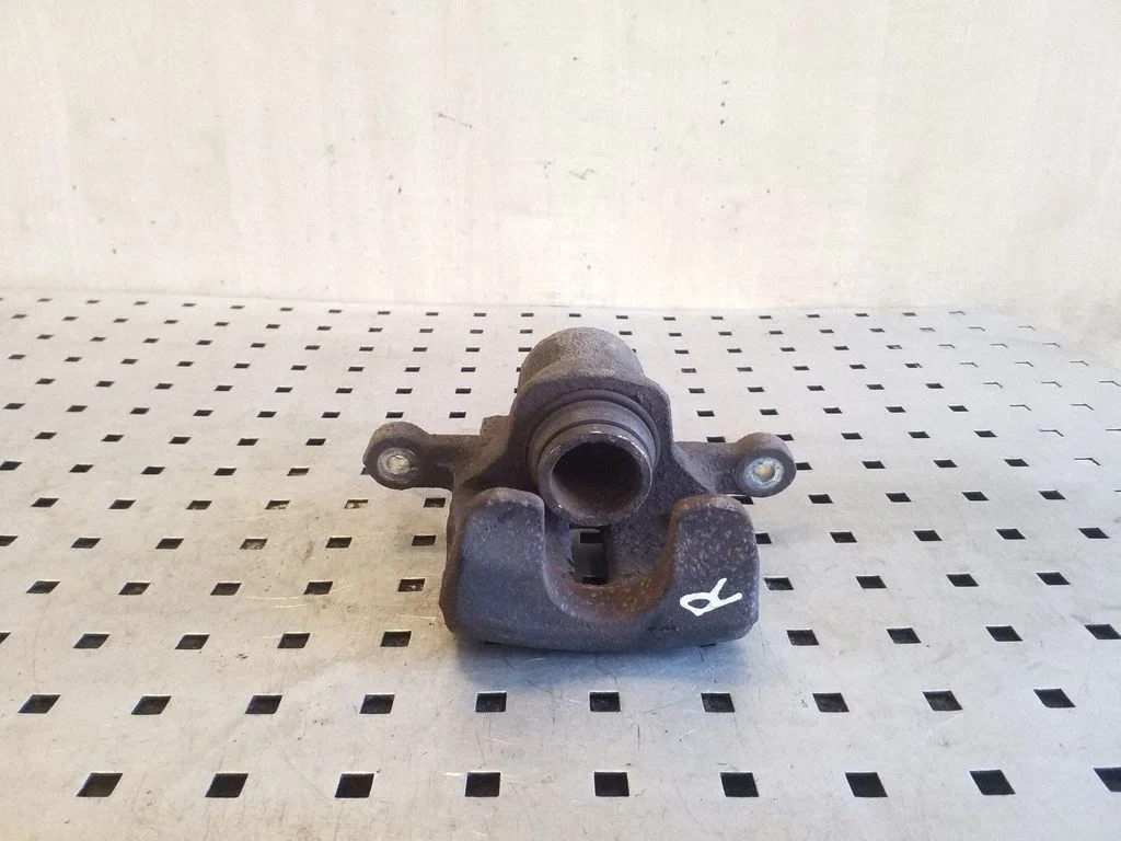 Rear brake caliper – right