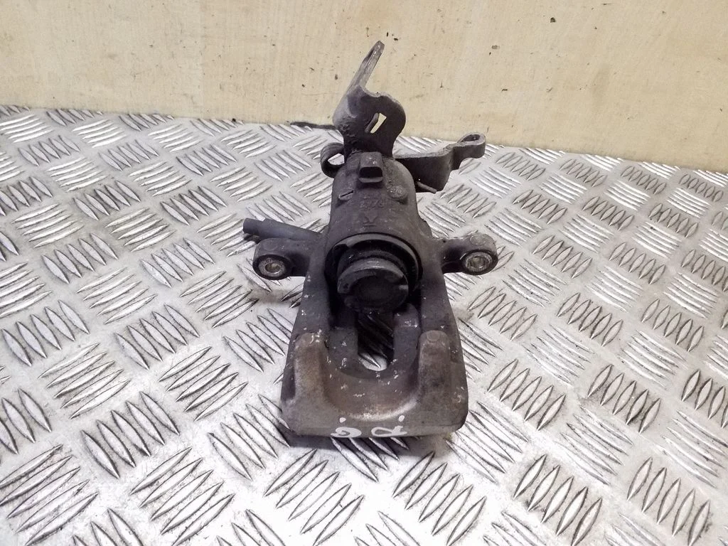 Rear brake caliper – right