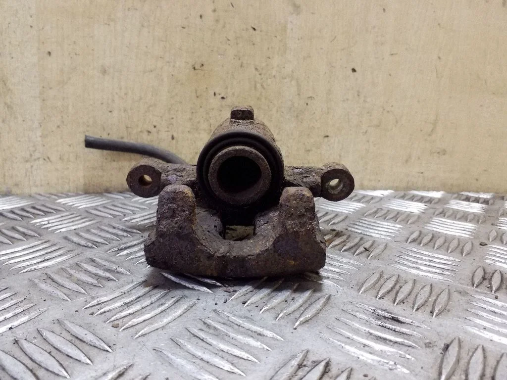 Rear brake caliper – right